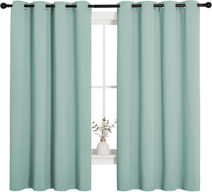 NICETOWN Halloween Pitch Black Solid Thermal Insulated Grommet Blackout Curtains/Drapes for Bedroom Window (2 Panels, 42 inches Wide by 63 inches Long, Black) - Colors A
