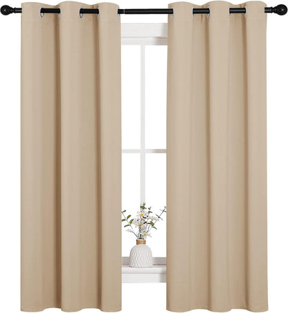 NICETOWN Halloween Pitch Black Solid Thermal Insulated Grommet Blackout Curtains/Drapes for Bedroom Window (2 Panels, 42 inches Wide by 63 inches Long, Black) - Colors D