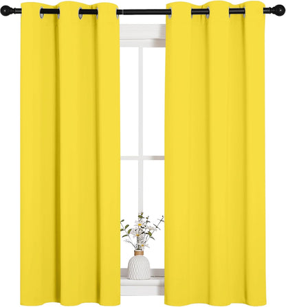 NICETOWN Halloween Pitch Black Solid Thermal Insulated Grommet Blackout Curtains/Drapes for Bedroom Window (2 Panels, 42 inches Wide by 63 inches Long, Black) - Colors C