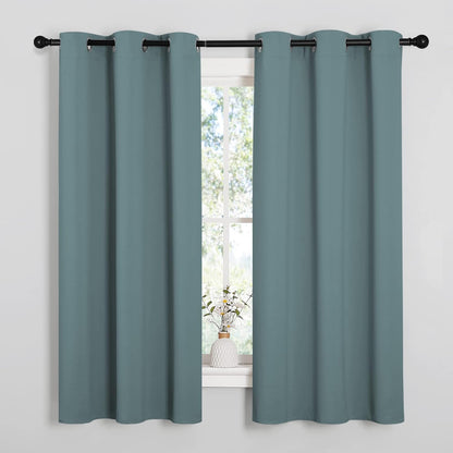 NICETOWN Halloween Pitch Black Solid Thermal Insulated Grommet Blackout Curtains/Drapes for Bedroom Window (2 Panels, 42 inches Wide by 63 inches Long, Black) - Colors C
