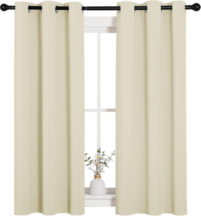 NICETOWN Halloween Pitch Black Solid Thermal Insulated Grommet Blackout Curtains/Drapes for Bedroom Window (2 Panels, 42 inches Wide by 63 inches Long, Black) - Colors C