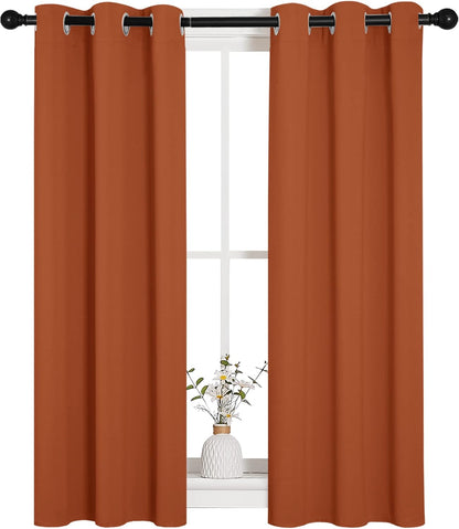 NICETOWN Halloween Pitch Black Solid Thermal Insulated Grommet Blackout Curtains/Drapes for Bedroom Window (2 Panels, 42 inches Wide by 63 inches Long, Black) - Colors B