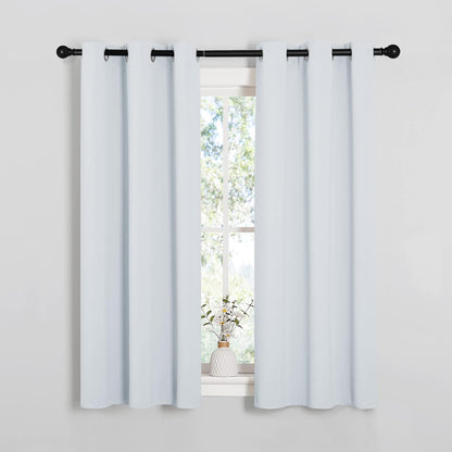 NICETOWN Halloween Pitch Black Solid Thermal Insulated Grommet Blackout Curtains/Drapes for Bedroom Window (2 Panels, 42 inches Wide by 63 inches Long, Black) - Colors A