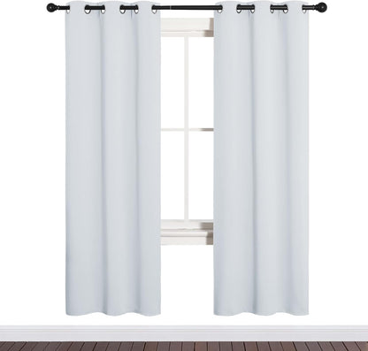 NICETOWN Halloween Pitch Black Solid Thermal Insulated Grommet Blackout Curtains/Drapes for Bedroom Window (2 Panels, 42 inches Wide by 63 inches Long, Black) - Colors A
