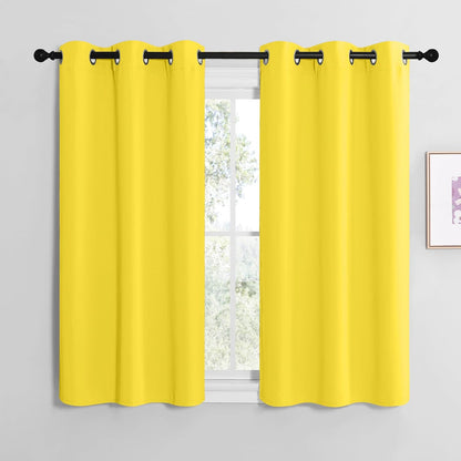 NICETOWN Halloween Pitch Black Solid Thermal Insulated Grommet Blackout Curtains/Drapes for Bedroom Window (2 Panels, 42 inches Wide by 63 inches Long, Black) - Colors C