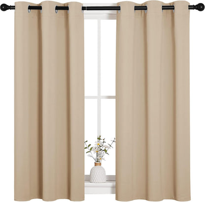 NICETOWN Halloween Pitch Black Solid Thermal Insulated Grommet Blackout Curtains/Drapes for Bedroom Window (2 Panels, 42 inches Wide by 63 inches Long, Black) - Colors D