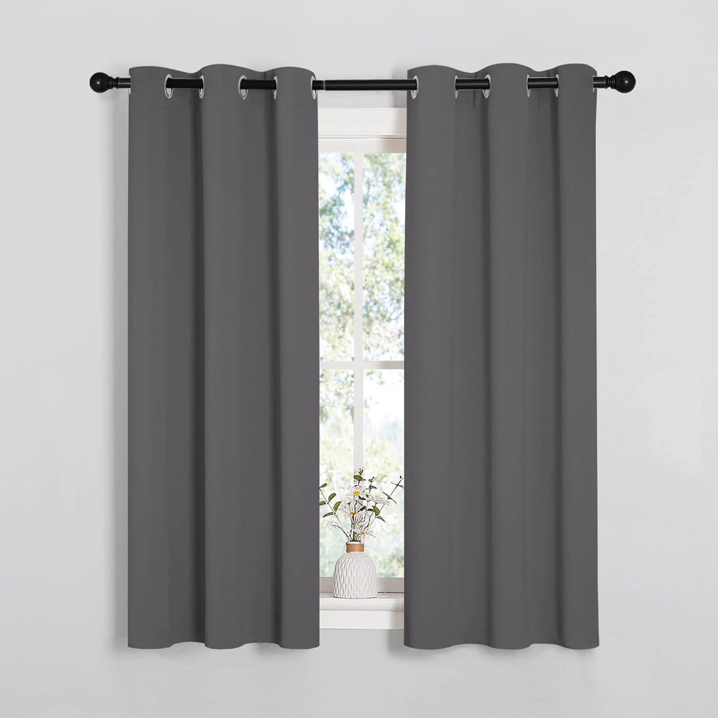 NICETOWN Halloween Pitch Black Solid Thermal Insulated Grommet Blackout Curtains/Drapes for Bedroom Window (2 Panels, 42 inches Wide by 63 inches Long, Black) - Colors E