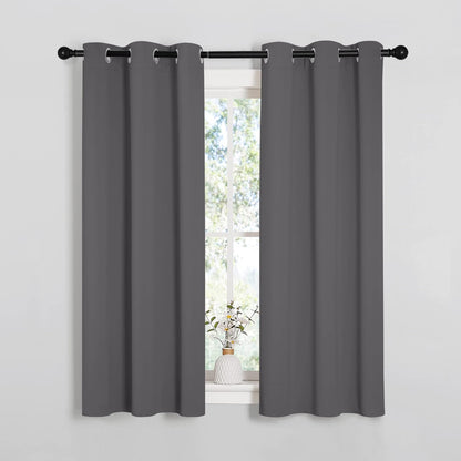 NICETOWN Halloween Pitch Black Solid Thermal Insulated Grommet Blackout Curtains/Drapes for Bedroom Window (2 Panels, 42 inches Wide by 63 inches Long, Black) - Colors E