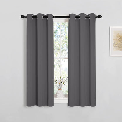 NICETOWN Halloween Pitch Black Solid Thermal Insulated Grommet Blackout Curtains/Drapes for Bedroom Window (2 Panels, 42 inches Wide by 63 inches Long, Black) - Colors E