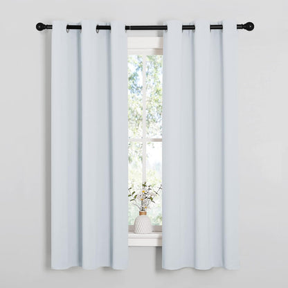 NICETOWN Halloween Pitch Black Solid Thermal Insulated Grommet Blackout Curtains/Drapes for Bedroom Window (2 Panels, 42 inches Wide by 63 inches Long, Black) - Colors A