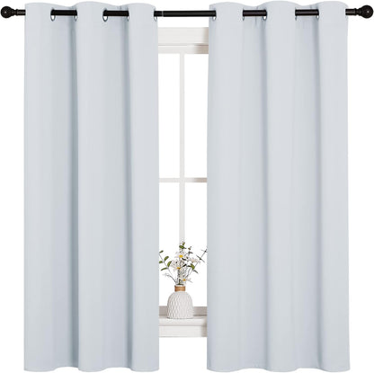 NICETOWN Halloween Pitch Black Solid Thermal Insulated Grommet Blackout Curtains/Drapes for Bedroom Window (2 Panels, 42 inches Wide by 63 inches Long, Black) - Colors A