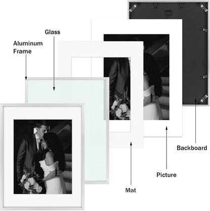 Frametory, Black Aluminum Picture Frame with Removable Mat - Set of 7 Includes Four 5x7, Two 8x10, One 11x14 - Real Glass Front - Simple Gallery Wall Frames for Art Prints and Posters