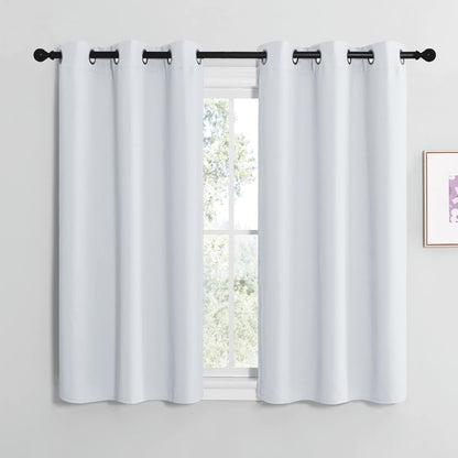 NICETOWN Halloween Pitch Black Solid Thermal Insulated Grommet Blackout Curtains/Drapes for Bedroom Window (2 Panels, 42 inches Wide by 63 inches Long, Black) - Colors A