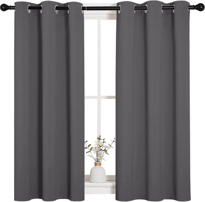 NICETOWN Halloween Pitch Black Solid Thermal Insulated Grommet Blackout Curtains/Drapes for Bedroom Window (2 Panels, 42 inches Wide by 63 inches Long, Black) - Colors E