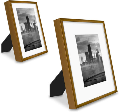 Frametory, Black Aluminum Picture Frame with Removable Mat - Set of 7 Includes Four 5x7, Two 8x10, One 11x14 - Real Glass Front - Simple Gallery Wall Frames for Art Prints and Posters