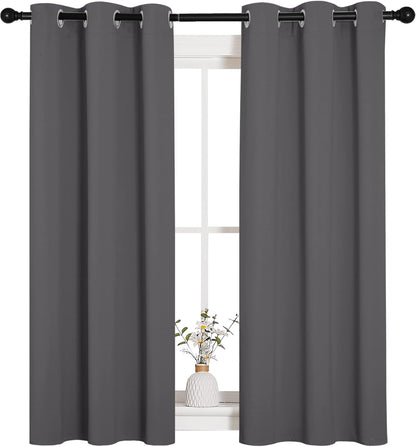 NICETOWN Halloween Pitch Black Solid Thermal Insulated Grommet Blackout Curtains/Drapes for Bedroom Window (2 Panels, 42 inches Wide by 63 inches Long, Black) - Colors E