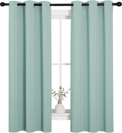 NICETOWN Halloween Pitch Black Solid Thermal Insulated Grommet Blackout Curtains/Drapes for Bedroom Window (2 Panels, 42 inches Wide by 63 inches Long, Black) - Colors A
