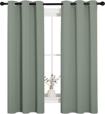 NICETOWN Halloween Pitch Black Solid Thermal Insulated Grommet Blackout Curtains/Drapes for Bedroom Window (2 Panels, 42 inches Wide by 63 inches Long, Black) - Colors B