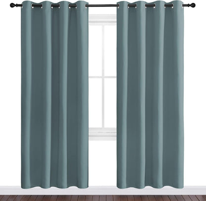 NICETOWN Halloween Pitch Black Solid Thermal Insulated Grommet Blackout Curtains/Drapes for Bedroom Window (2 Panels, 42 inches Wide by 63 inches Long, Black) - Colors C