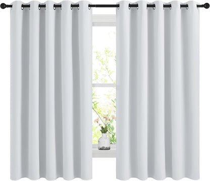 NICETOWN Halloween Pitch Black Solid Thermal Insulated Grommet Blackout Curtains/Drapes for Bedroom Window (2 Panels, 42 inches Wide by 63 inches Long, Black) - Colors D