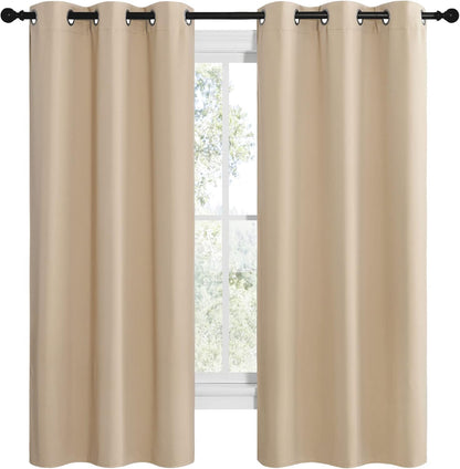 NICETOWN Halloween Pitch Black Solid Thermal Insulated Grommet Blackout Curtains/Drapes for Bedroom Window (2 Panels, 42 inches Wide by 63 inches Long, Black) - Colors D