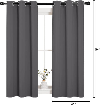 NICETOWN Halloween Pitch Black Solid Thermal Insulated Grommet Blackout Curtains/Drapes for Bedroom Window (2 Panels, 42 inches Wide by 63 inches Long, Black) - Colors E