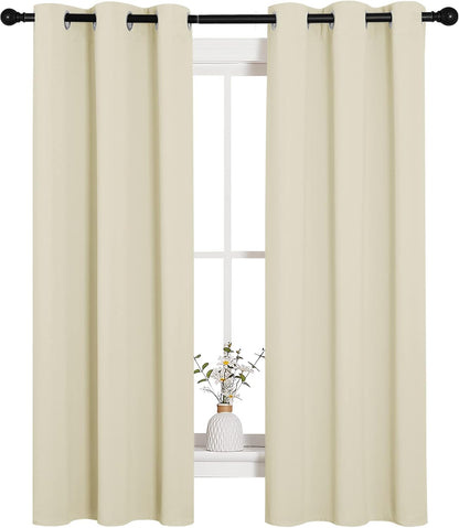 NICETOWN Halloween Pitch Black Solid Thermal Insulated Grommet Blackout Curtains/Drapes for Bedroom Window (2 Panels, 42 inches Wide by 63 inches Long, Black) - Colors C