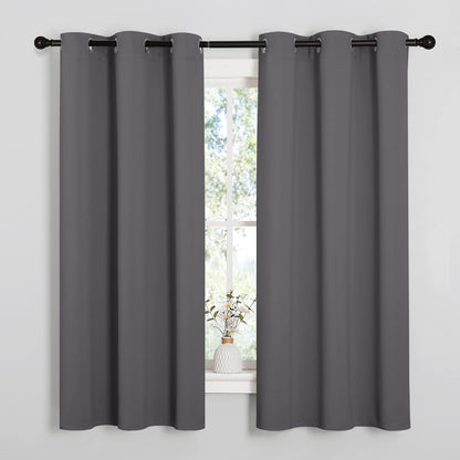NICETOWN Halloween Pitch Black Solid Thermal Insulated Grommet Blackout Curtains/Drapes for Bedroom Window (2 Panels, 42 inches Wide by 63 inches Long, Black) - Colors E