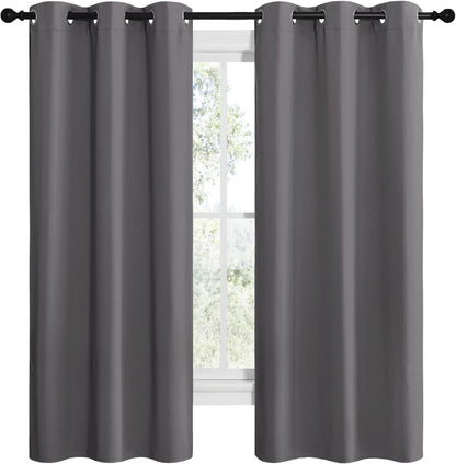 NICETOWN Halloween Pitch Black Solid Thermal Insulated Grommet Blackout Curtains/Drapes for Bedroom Window (2 Panels, 42 inches Wide by 63 inches Long, Black) - Colors E