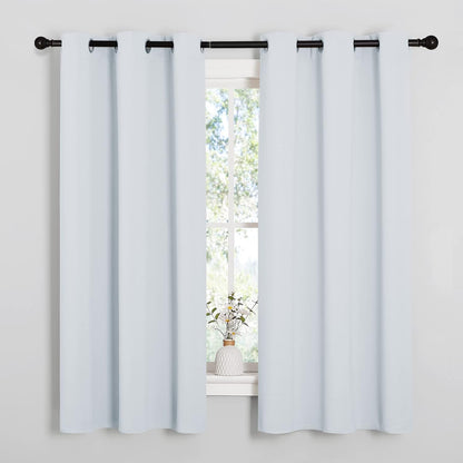 NICETOWN Halloween Pitch Black Solid Thermal Insulated Grommet Blackout Curtains/Drapes for Bedroom Window (2 Panels, 42 inches Wide by 63 inches Long, Black) - Colors A