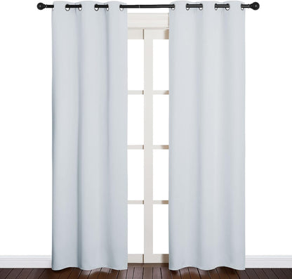 NICETOWN Halloween Pitch Black Solid Thermal Insulated Grommet Blackout Curtains/Drapes for Bedroom Window (2 Panels, 42 inches Wide by 63 inches Long, Black) - Colors A