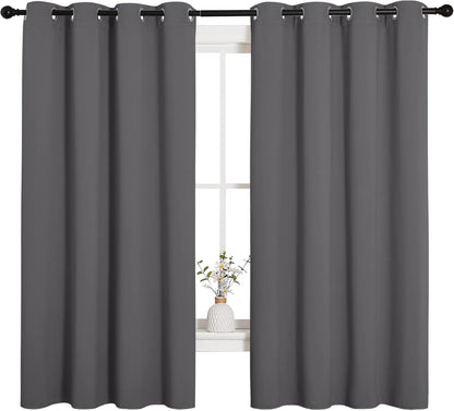 NICETOWN Halloween Pitch Black Solid Thermal Insulated Grommet Blackout Curtains/Drapes for Bedroom Window (2 Panels, 42 inches Wide by 63 inches Long, Black) - Colors E