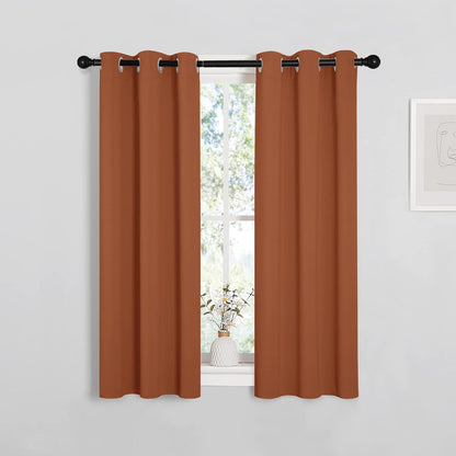 NICETOWN Halloween Pitch Black Solid Thermal Insulated Grommet Blackout Curtains/Drapes for Bedroom Window (2 Panels, 42 inches Wide by 63 inches Long, Black) - Colors B