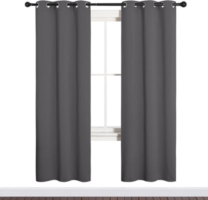 NICETOWN Halloween Pitch Black Solid Thermal Insulated Grommet Blackout Curtains/Drapes for Bedroom Window (2 Panels, 42 inches Wide by 63 inches Long, Black) - Colors E
