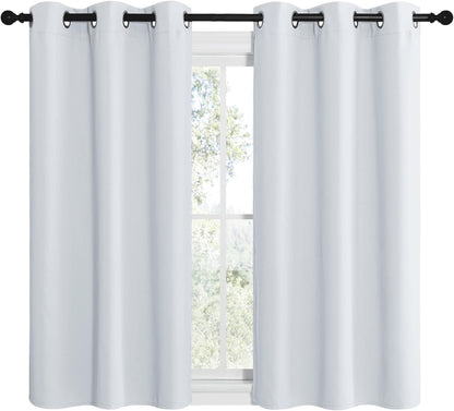 NICETOWN Halloween Pitch Black Solid Thermal Insulated Grommet Blackout Curtains/Drapes for Bedroom Window (2 Panels, 42 inches Wide by 63 inches Long, Black) - Colors A