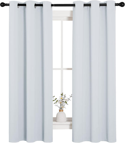 NICETOWN Halloween Pitch Black Solid Thermal Insulated Grommet Blackout Curtains/Drapes for Bedroom Window (2 Panels, 42 inches Wide by 63 inches Long, Black) - Colors A