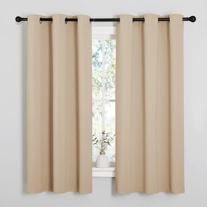 NICETOWN Halloween Pitch Black Solid Thermal Insulated Grommet Blackout Curtains/Drapes for Bedroom Window (2 Panels, 42 inches Wide by 63 inches Long, Black) - Colors D