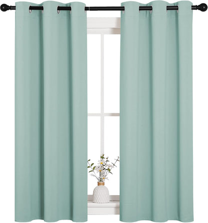 NICETOWN Halloween Pitch Black Solid Thermal Insulated Grommet Blackout Curtains/Drapes for Bedroom Window (2 Panels, 42 inches Wide by 63 inches Long, Black) - Colors A