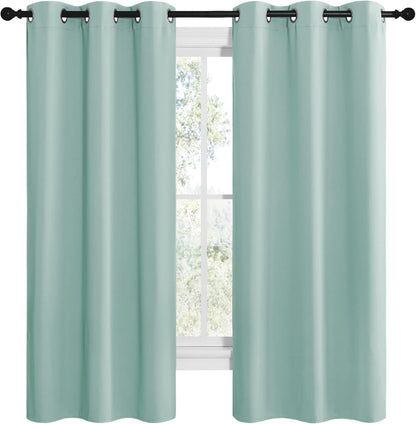 NICETOWN Halloween Pitch Black Solid Thermal Insulated Grommet Blackout Curtains/Drapes for Bedroom Window (2 Panels, 42 inches Wide by 63 inches Long, Black) - Colors A