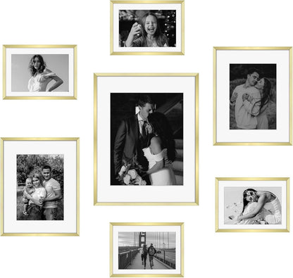 Frametory, Black Aluminum Picture Frame with Removable Mat - Set of 7 Includes Four 5x7, Two 8x10, One 11x14 - Real Glass Front - Simple Gallery Wall Frames for Art Prints and Posters