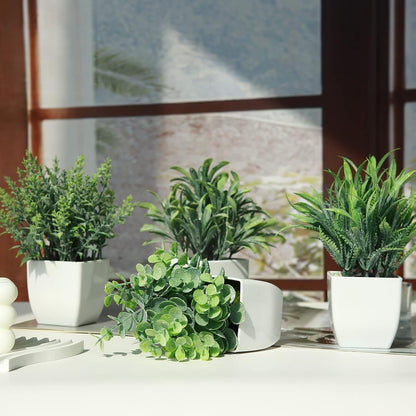 GREENTIME 4 Pack Fake Plants in Black Pot Mini Artificial Eucalyptus Potted Plant Small Faux Grass Greenery Potted for Indoor Home Office Farmhouse Bathroom Table Decoration