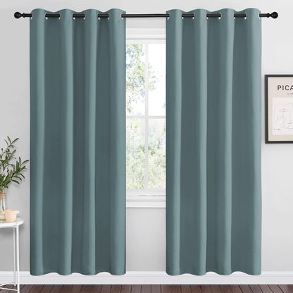 NICETOWN Halloween Pitch Black Solid Thermal Insulated Grommet Blackout Curtains/Drapes for Bedroom Window (2 Panels, 42 inches Wide by 63 inches Long, Black) - Colors C