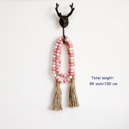 CVHOMEDECO. Wood Beads Garland with Tassels Farmhouse Rustic Wooden Prayer Bead String Wall Hanging Accent for Home Festival Decor. Mix Distressed
