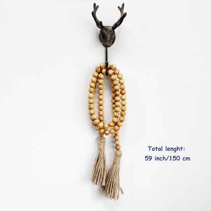 CVHOMEDECO. Wood Beads Garland with Tassels Farmhouse Rustic Wooden Prayer Bead String Wall Hanging Accent for Home Festival Decor. Mix Distressed