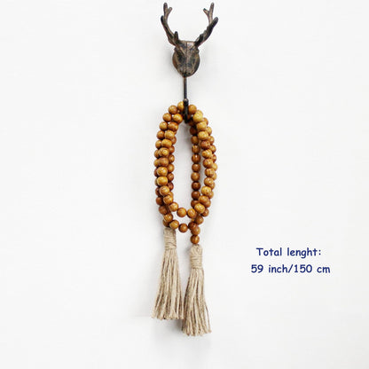 CVHOMEDECO. Wood Beads Garland with Tassels Farmhouse Rustic Wooden Prayer Bead String Wall Hanging Accent for Home Festival Decor. Mix Distressed