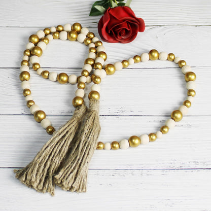 CVHOMEDECO. Wood Beads Garland with Tassels Farmhouse Rustic Wooden Prayer Bead String Wall Hanging Accent for Home Festival Decor. Mix Distressed