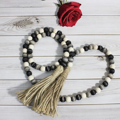 CVHOMEDECO. Wood Beads Garland with Tassels Farmhouse Rustic Wooden Prayer Bead String Wall Hanging Accent for Home Festival Decor. Mix Distressed