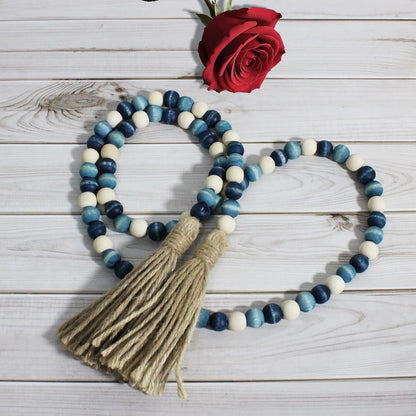 CVHOMEDECO. Wood Beads Garland with Tassels Farmhouse Rustic Wooden Prayer Bead String Wall Hanging Accent for Home Festival Decor. Mix Distressed