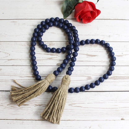 CVHOMEDECO. Wood Beads Garland with Tassels Farmhouse Rustic Wooden Prayer Bead String Wall Hanging Accent for Home Festival Decor. Mix Distressed