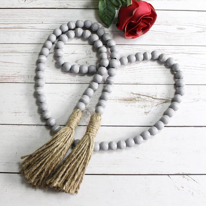 CVHOMEDECO. Wood Beads Garland with Tassels Farmhouse Rustic Wooden Prayer Bead String Wall Hanging Accent for Home Festival Decor. Mix Distressed